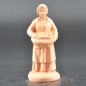 Femme aux savons brut