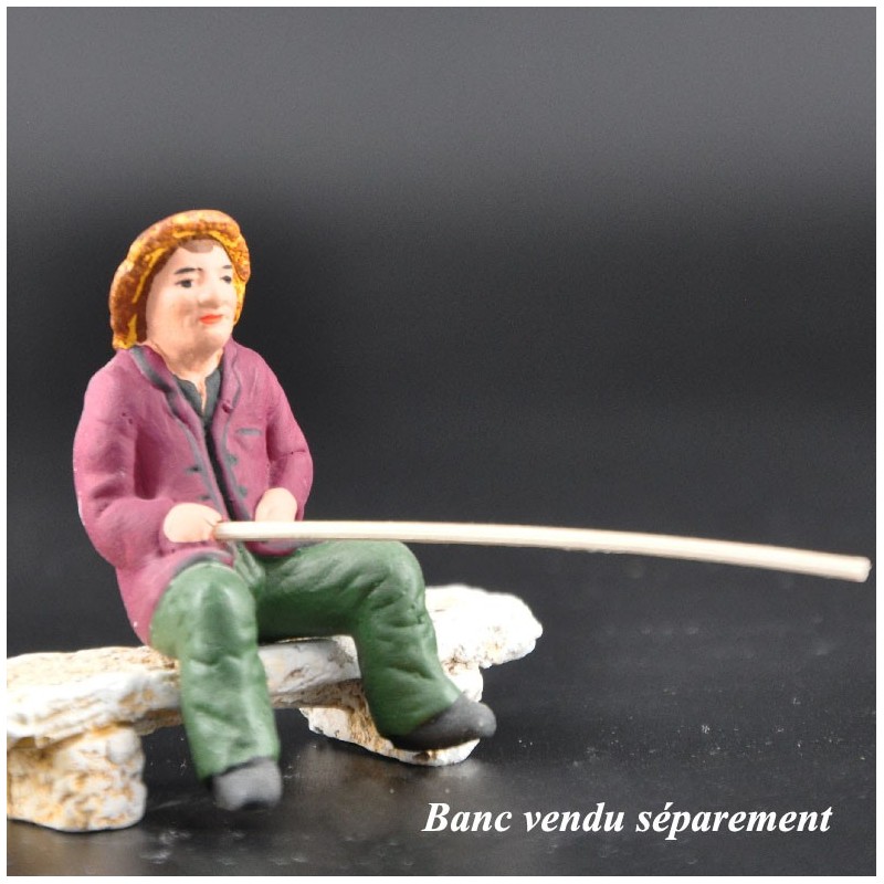 Pêcheur assis Pêcheur assis
